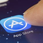 app store close up finger