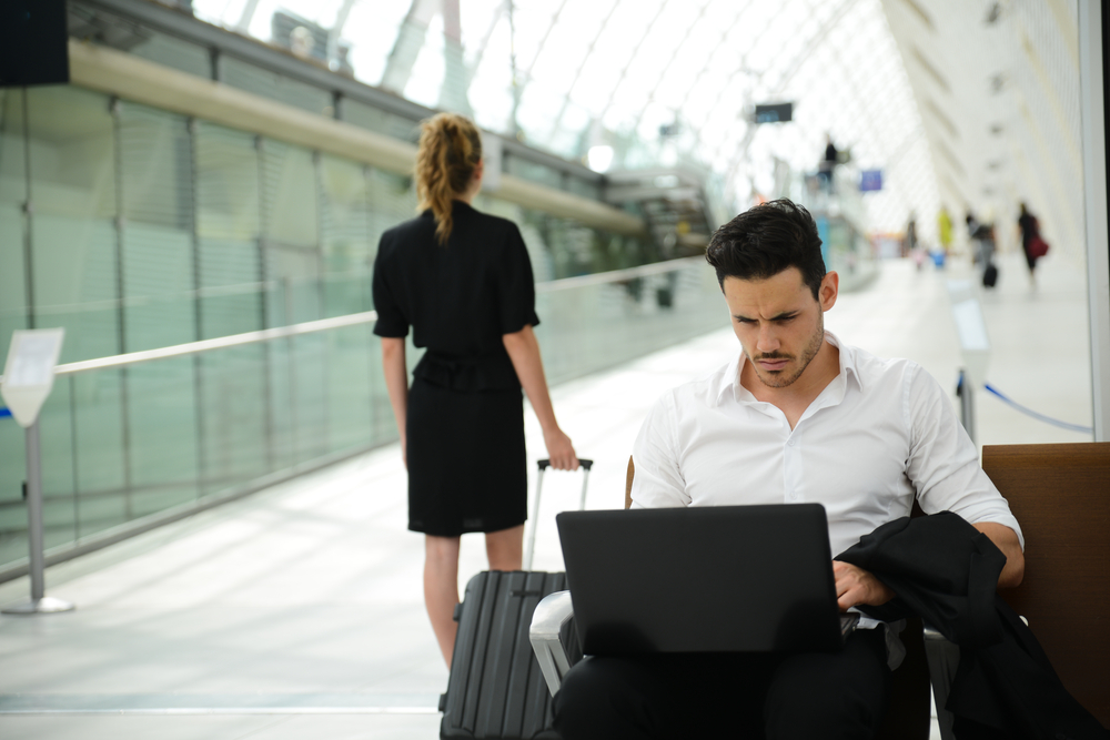 Wifi laptop man at airport